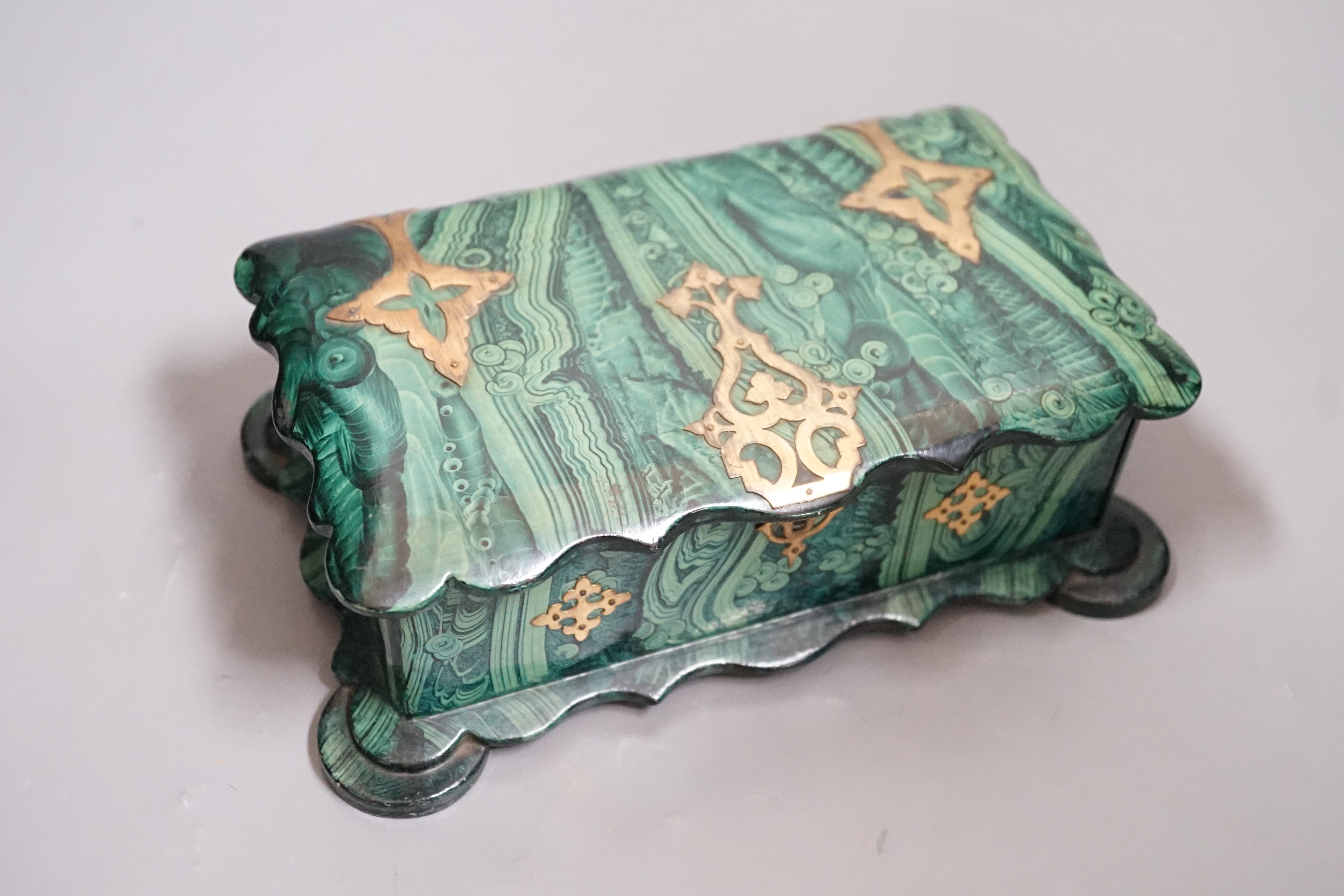 A Victorian papier-mâché-mache faux malachite, brass mounted jewellery box, 21cms wide x 12.5cms deep